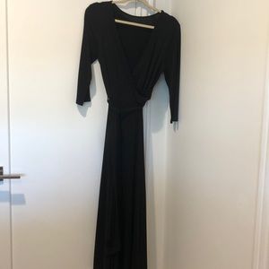 Black stretch polyester long dress.